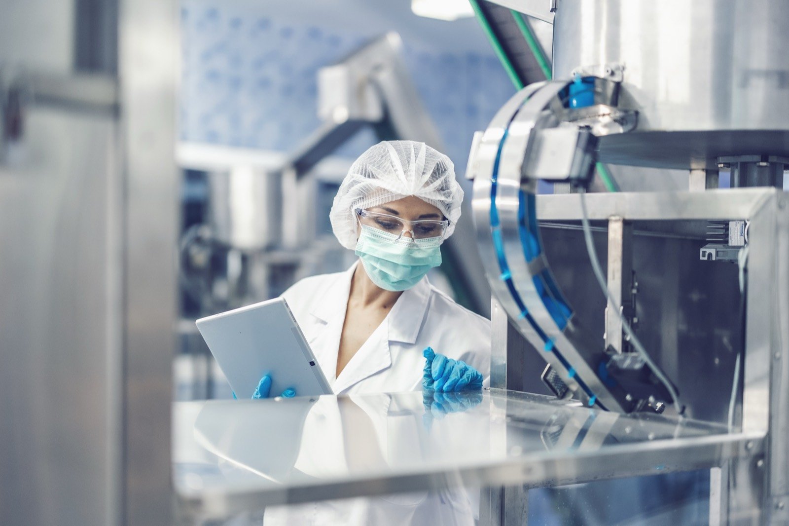 Precision medical-device manufacturing in a controlled cleanroom